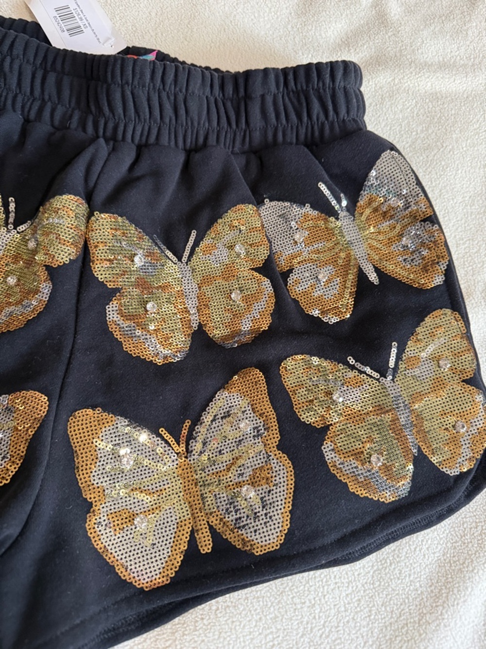 QUEEN OF SPARKLES Black High-Waist Sequin Butterfly Shorts - Picture 4 of 10